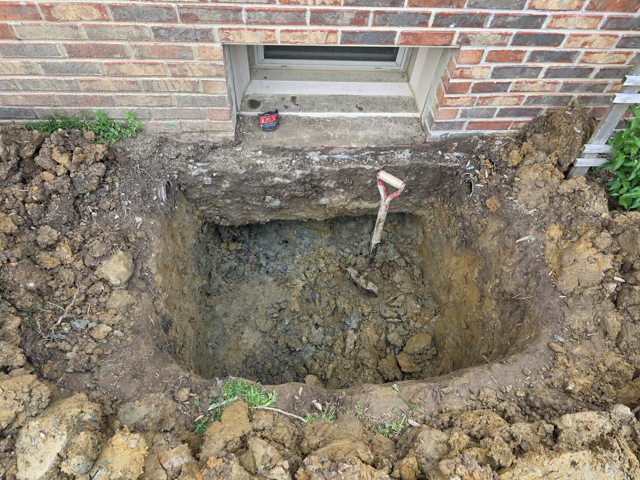 Egress Window Enlargement — Foundation Saw Cut