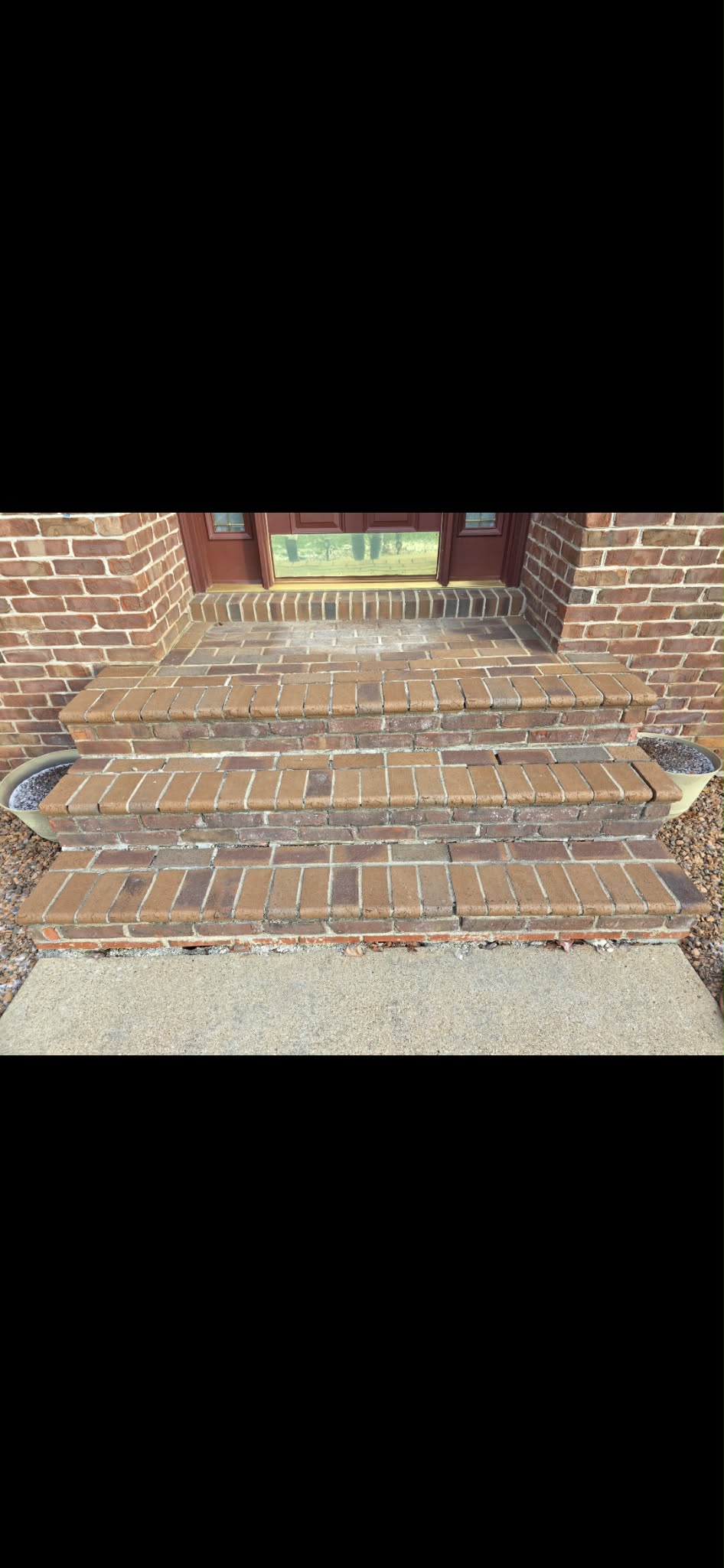 Close-up of tuckpointed brick stairway joints
