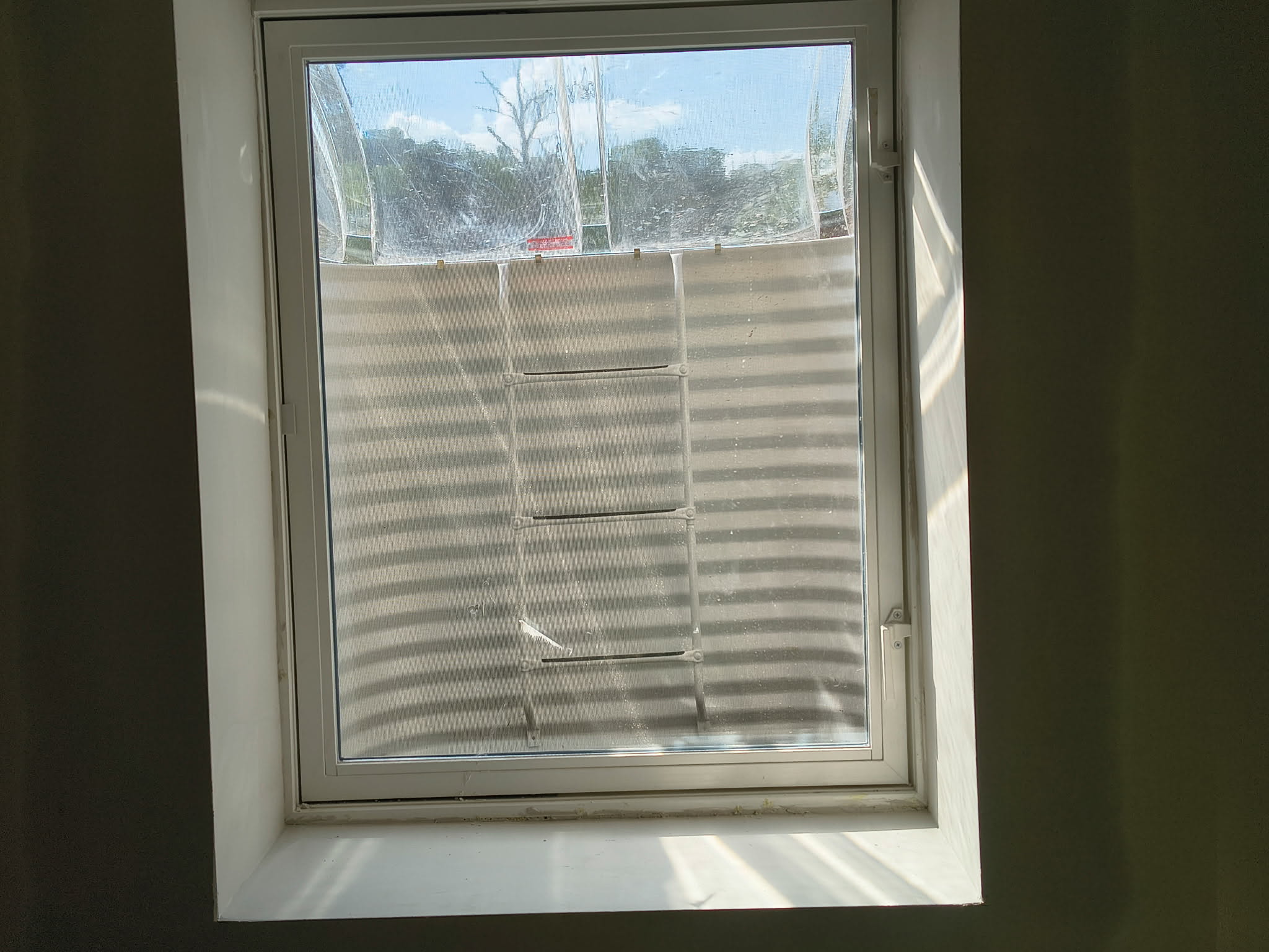 Window installations with wells, caps, and grading β photo 2