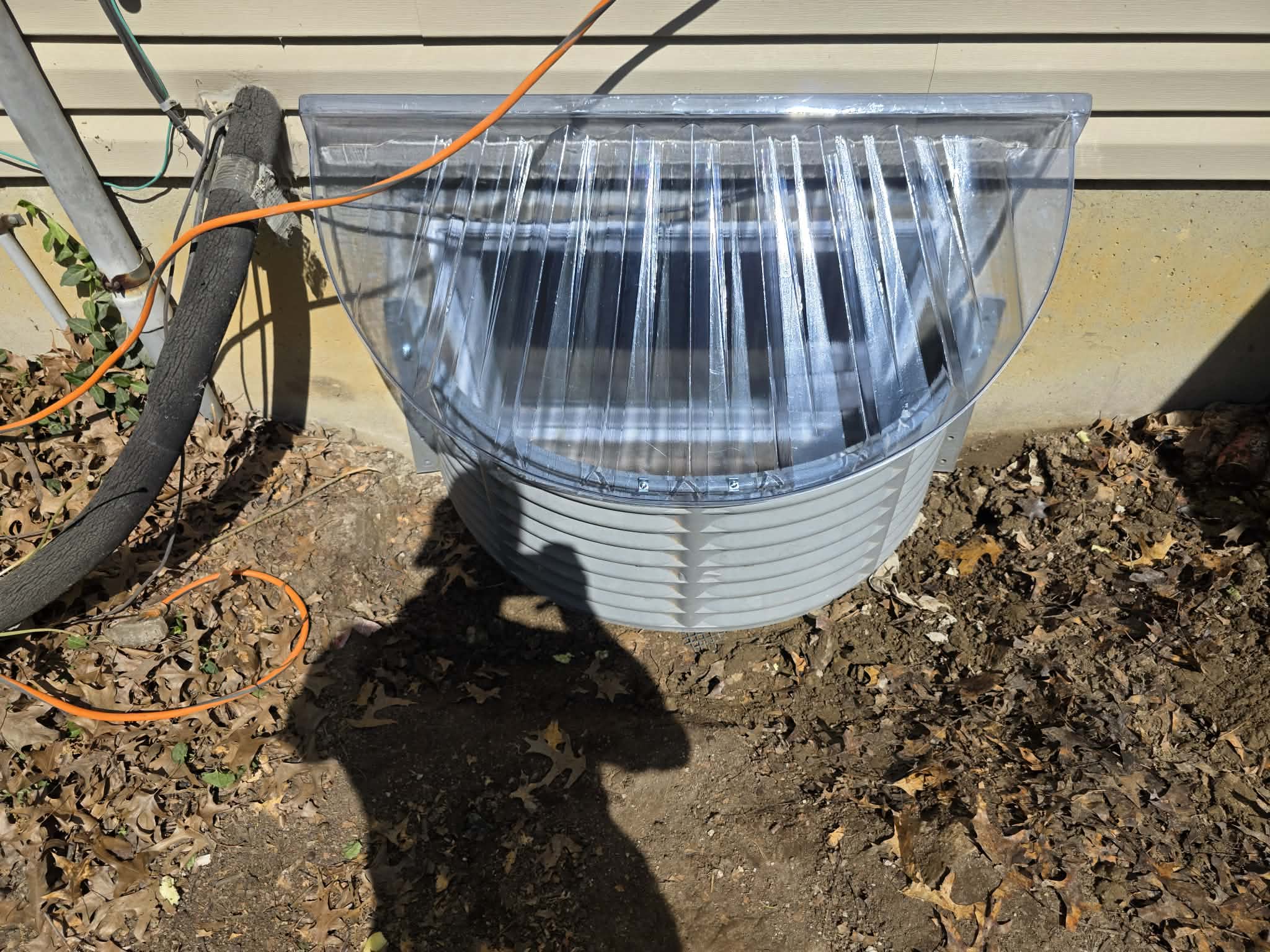 Window installations with wells, caps, and grading β photo 4