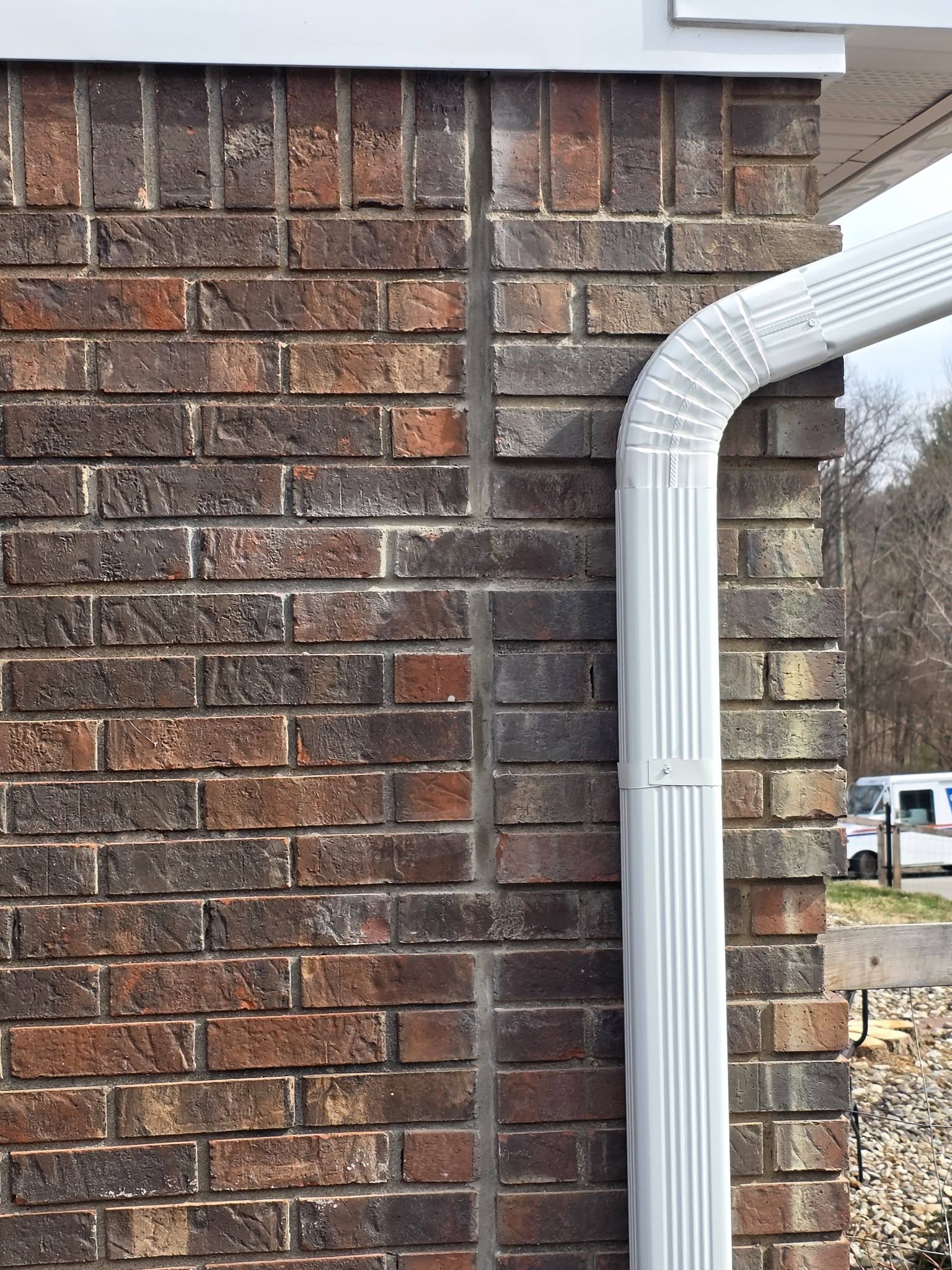 Repointed exterior brick around foundation