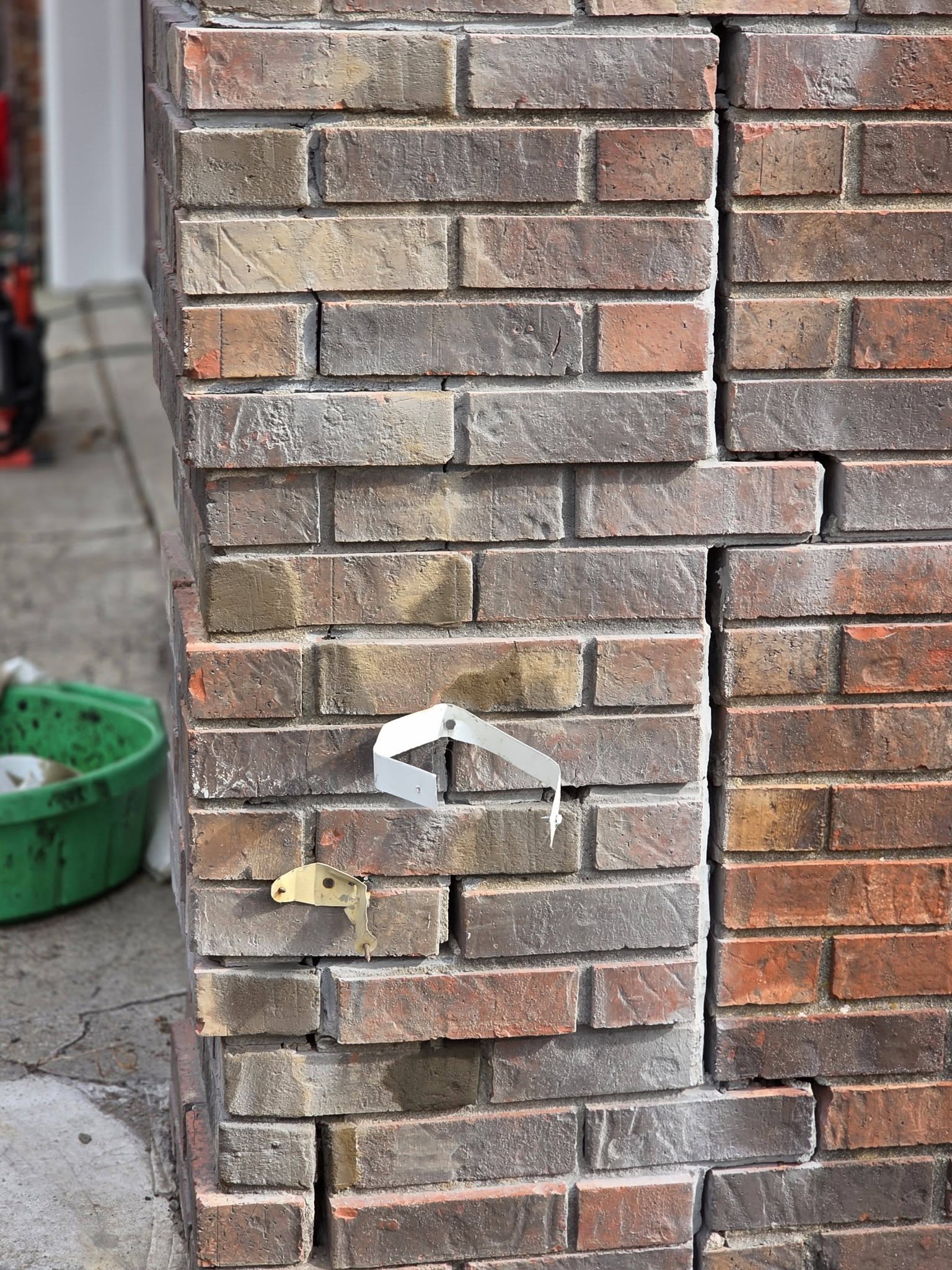 Masonry repair around a structural opening