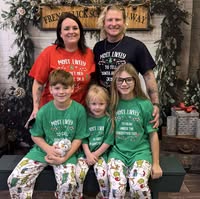 Nicholas Applegate with his family and the Cornerstone crew