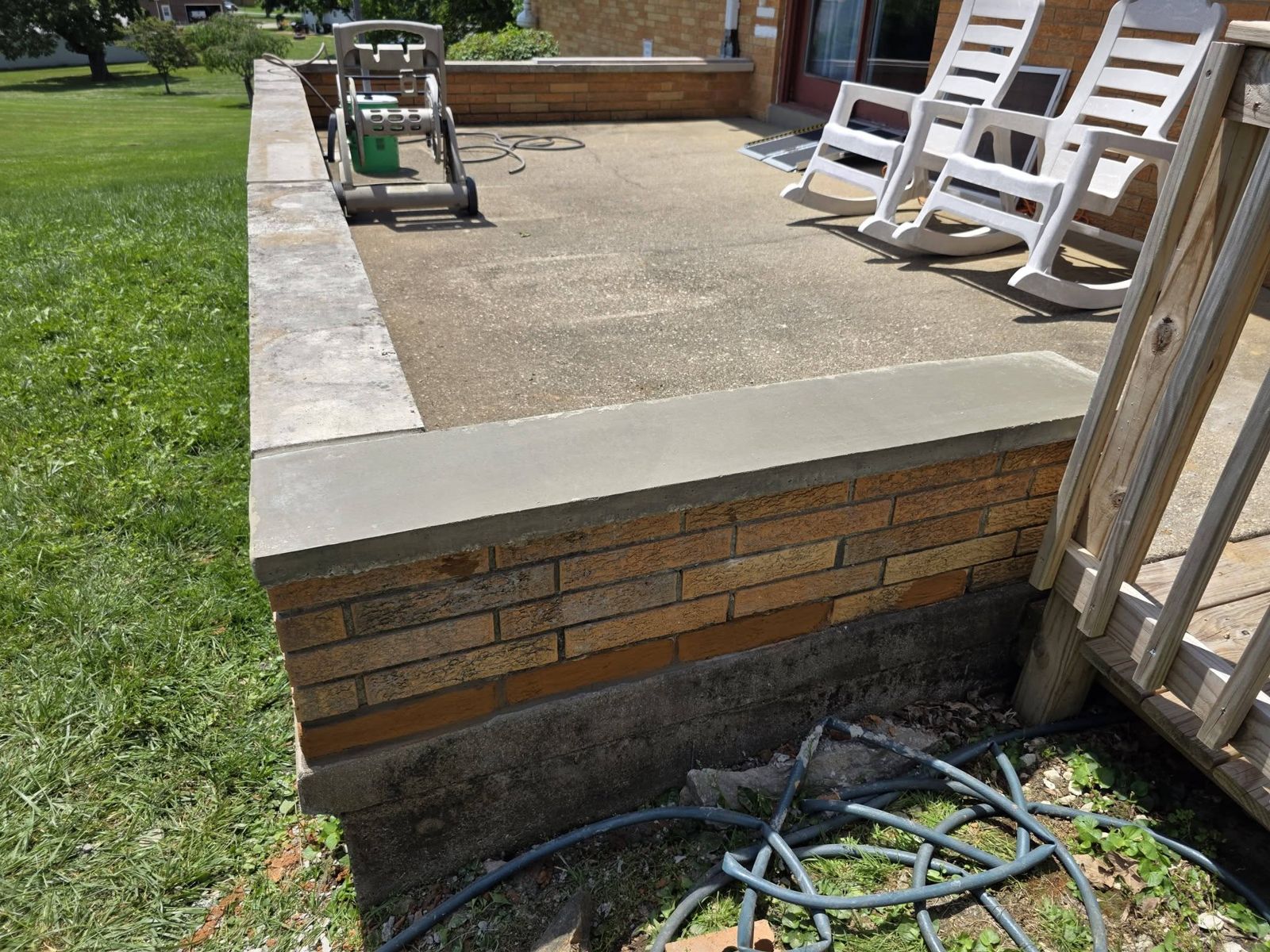 This Week's Work: 43' Curved Retaining Wall, French Drain & Grading — photo 5