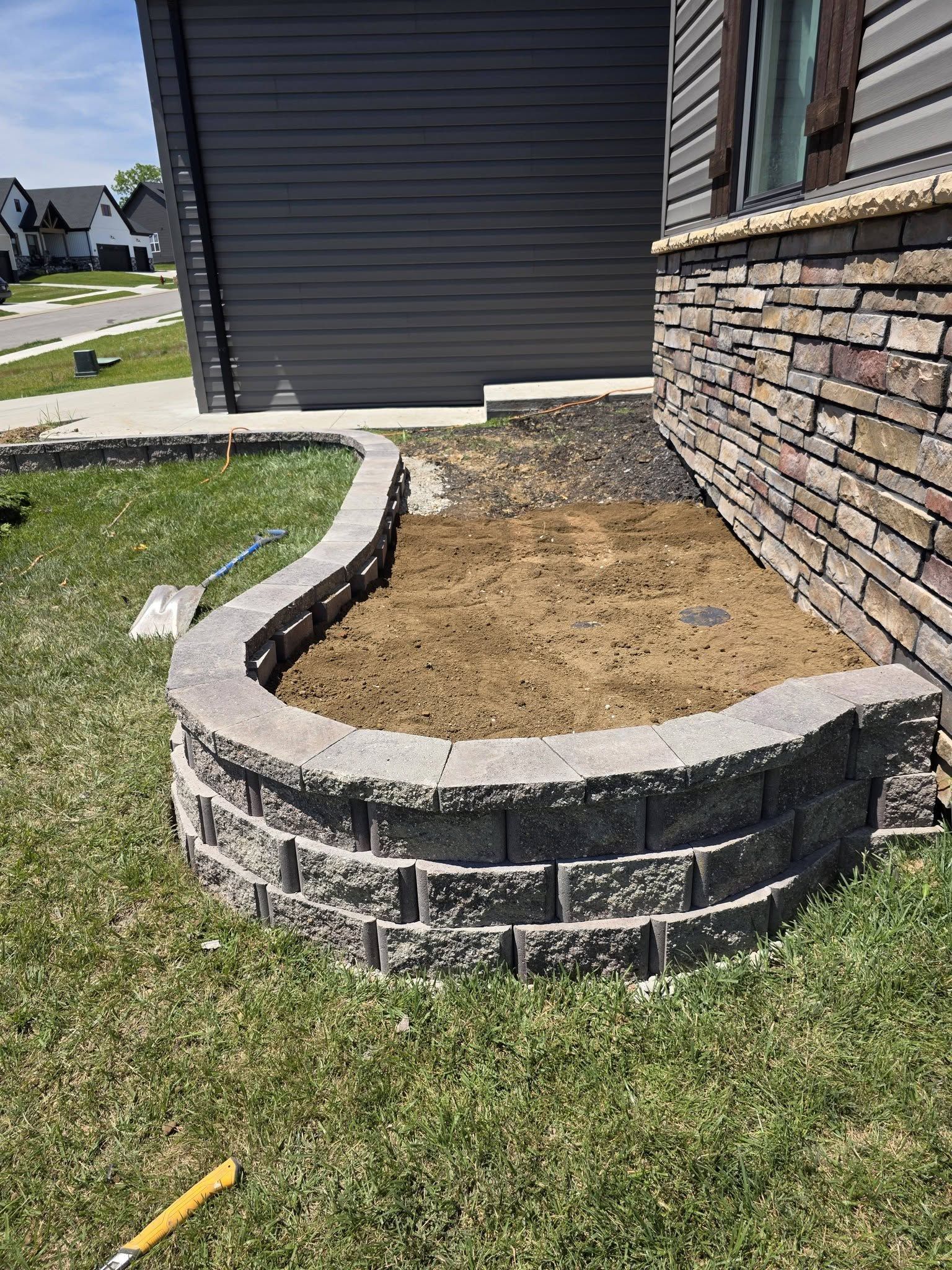 43' Curved Retaining Wall — before