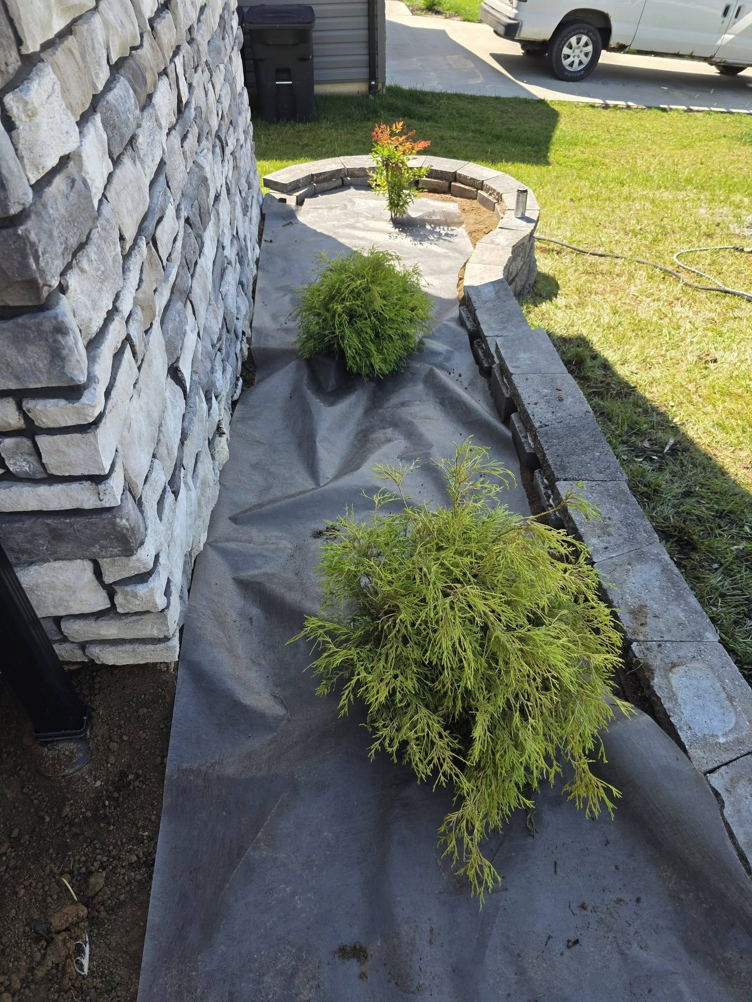This Week's Work: 43' Curved Retaining Wall, French Drain & Grading — photo 3
